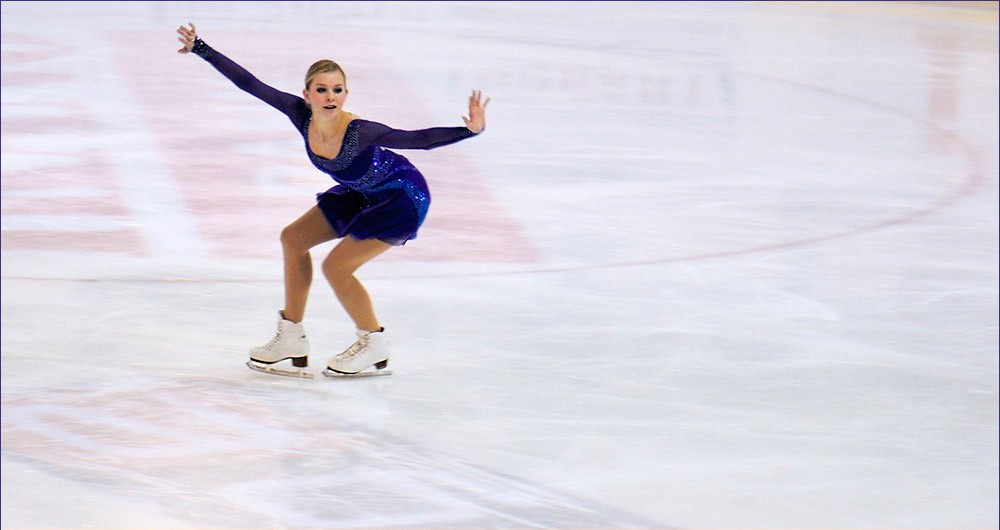 Figure Skater lining up a hip check!