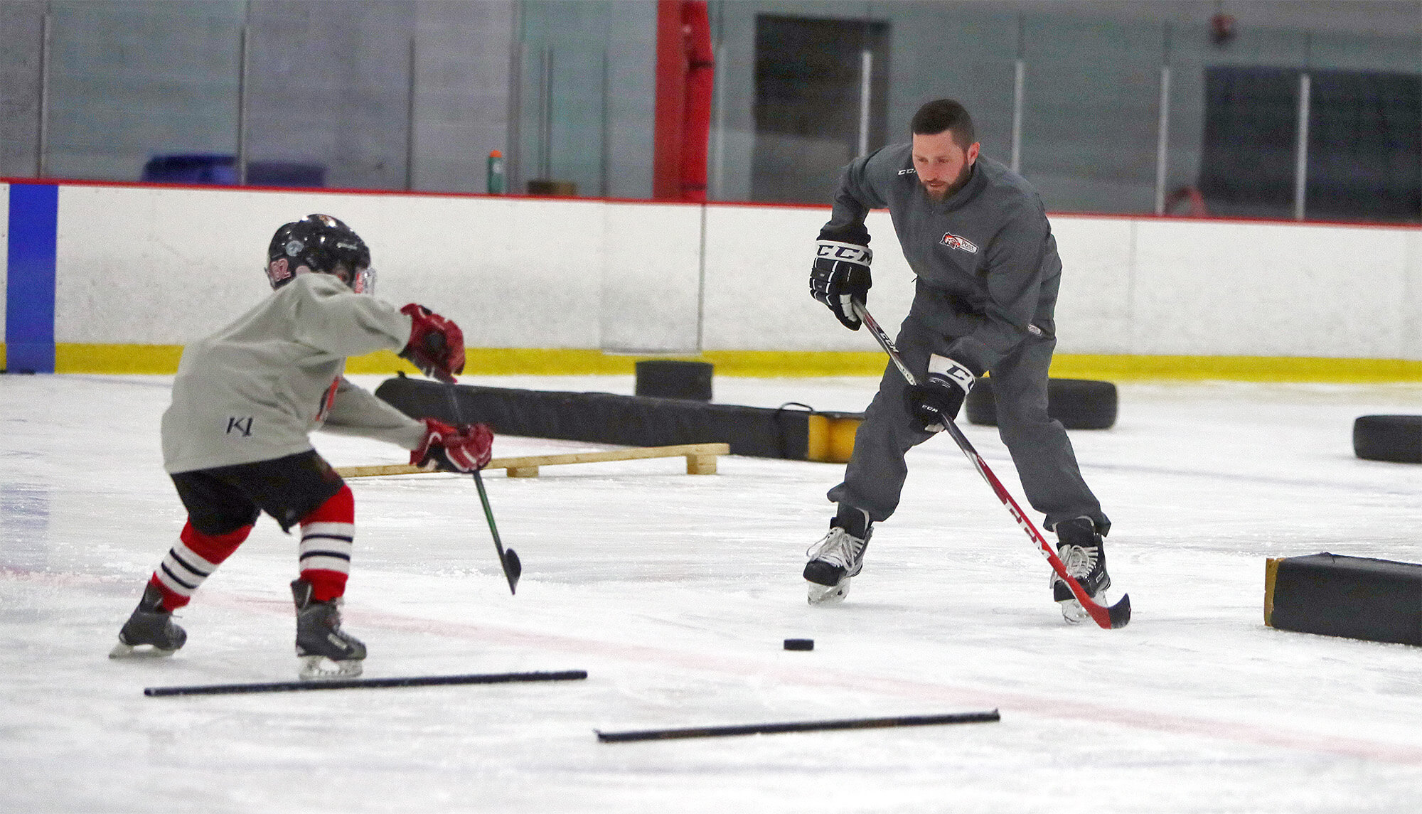 Duncan Rutsch works with Tim Richter of IPH Hockey