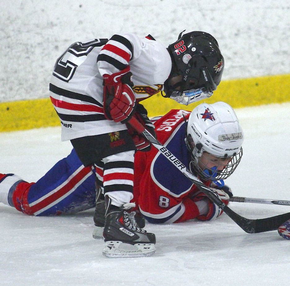 Duncan Rutsch checking on an injured opponent.